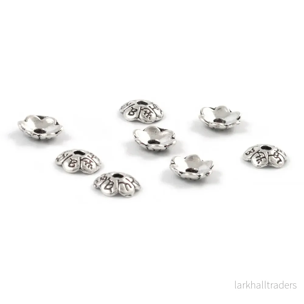 Pärlhattar, blomma med symboler, antiksilver, 6mm, 30st - Bild 2