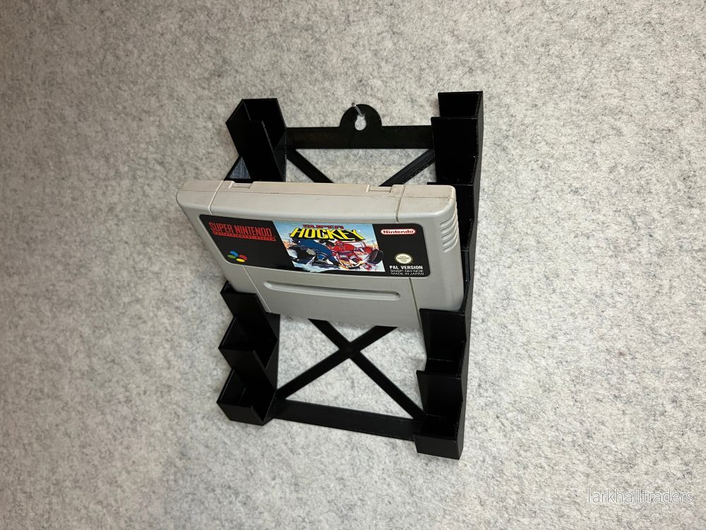 Vägghållare för 6 SNES-spel – X-ram design Vägghållare för 6 SNES-spel – X-ram design