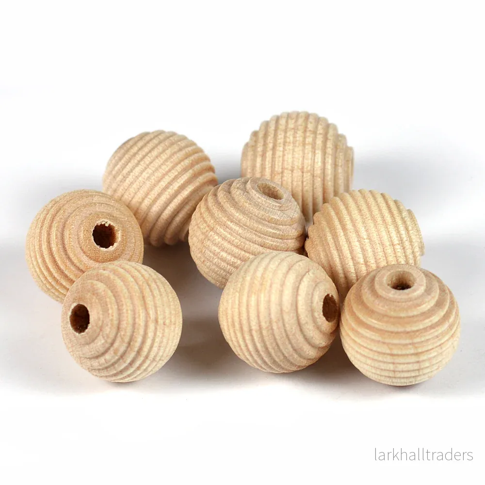 Räfflade träpärlor, 14mm, obehandlade, 16st Räfflade träpärlor, 14mm, obehandlade, 16st