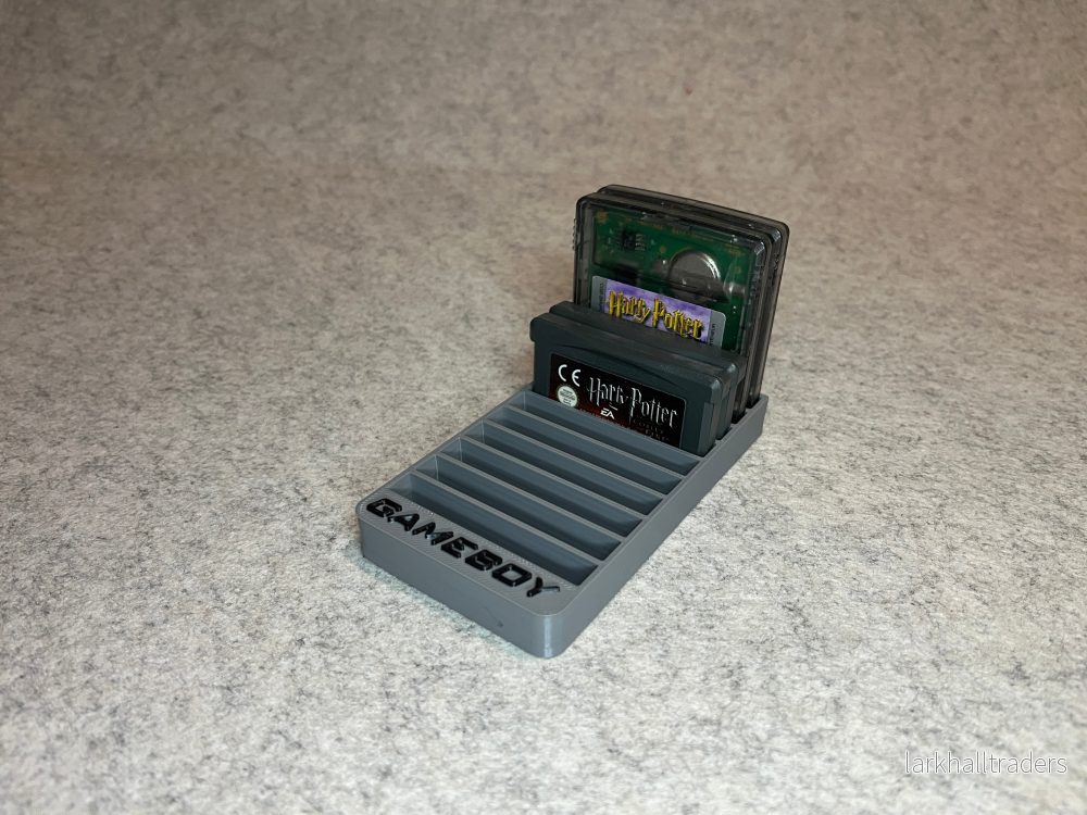 Spelställ för 10 GameBoy cartridge med GAMEBOY text