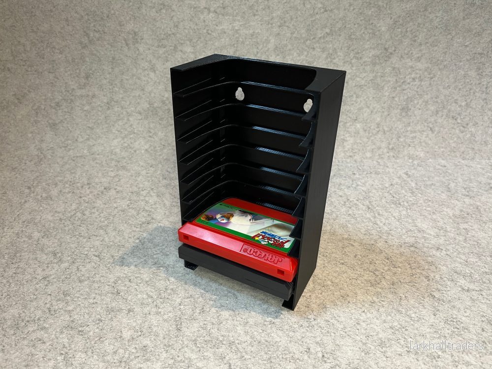 Vägghållare / spelställ för 10 Nintendo Famicom-kassetter