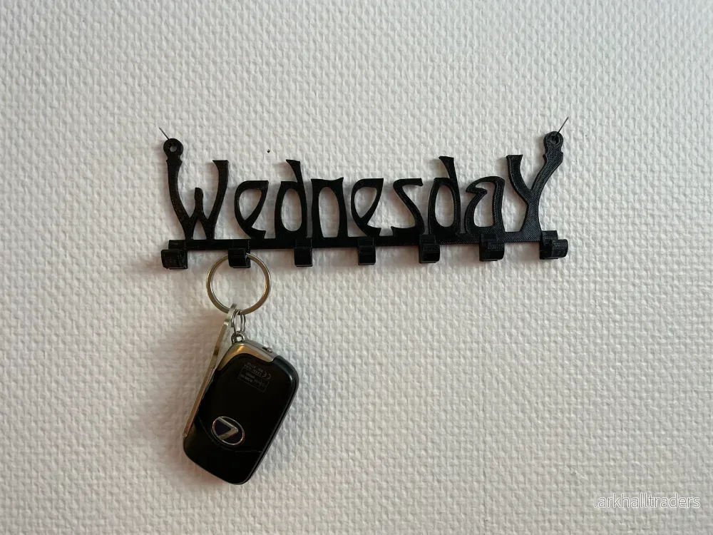 Nyckelkrok med ”Wednesday”-text – 7 krokar