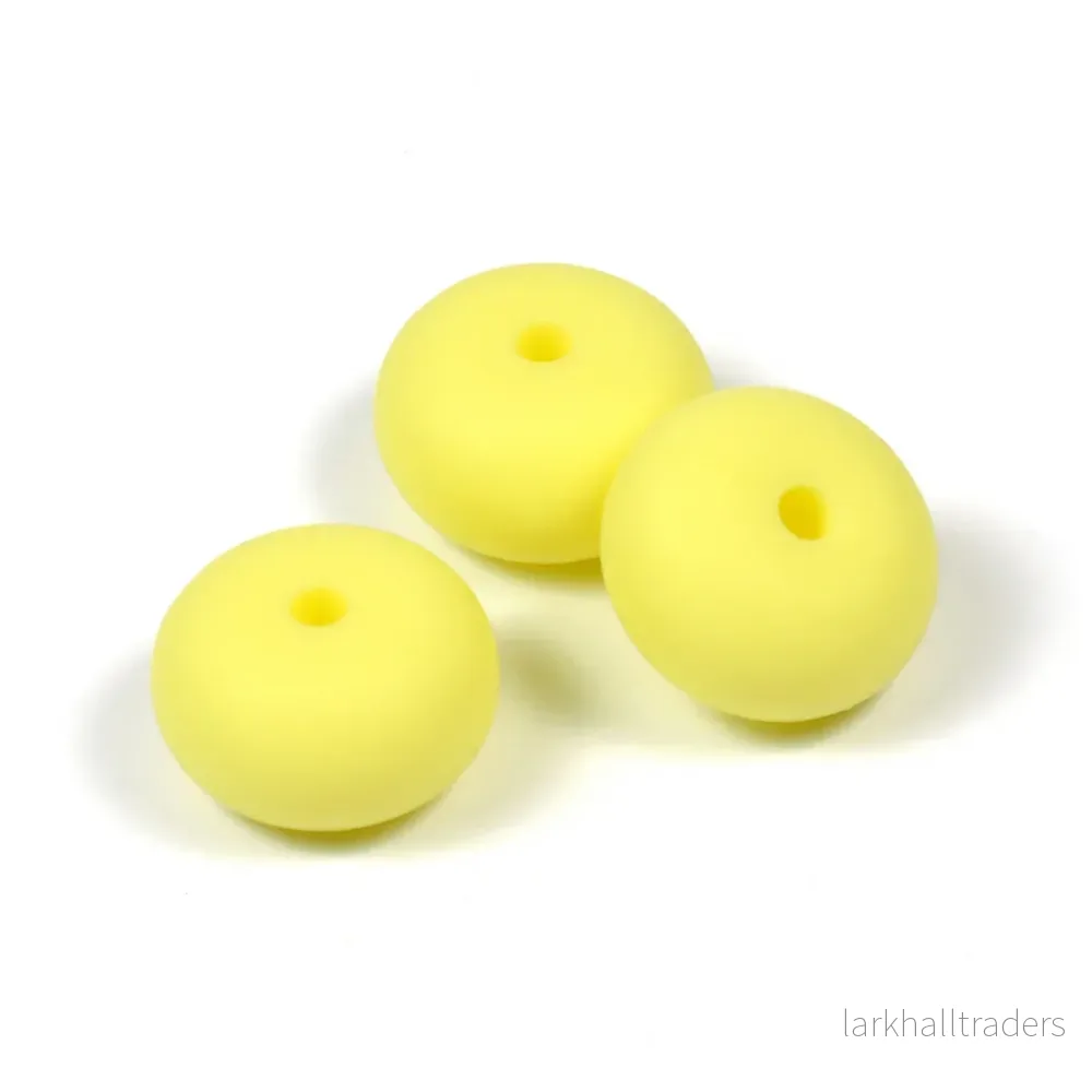 Abacus silikonpärlor, pastellgul, 3st