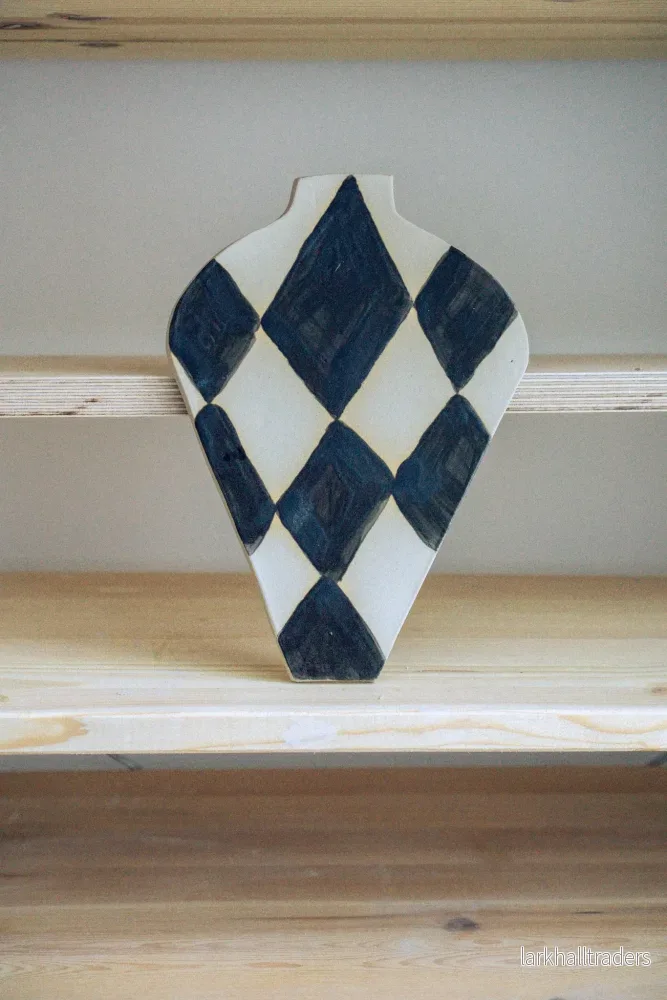 Väggkonst salmiak-vase