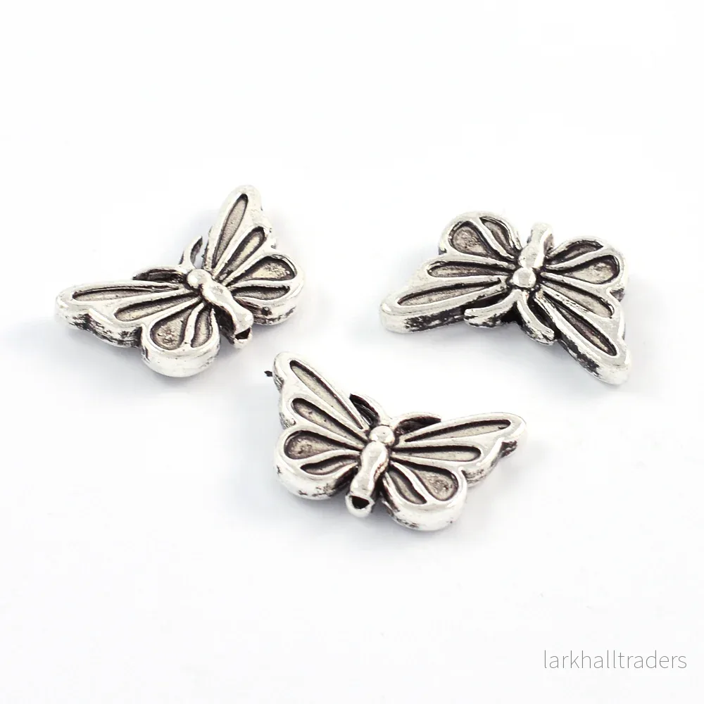 Metallpärlor, fjärilar, antiksilver, 17x10mm, 10st