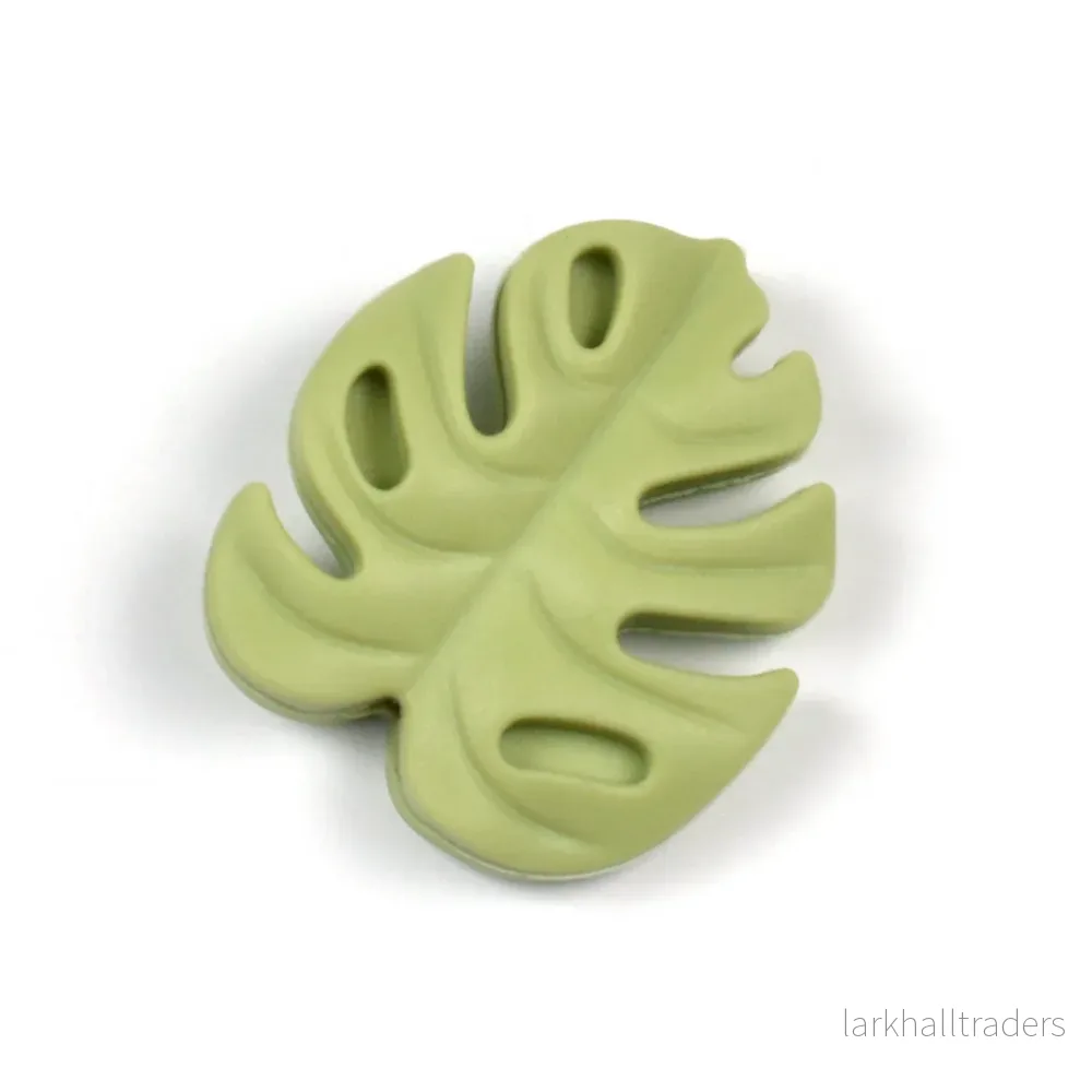 Motivpärla i silikon, litet monstera blad