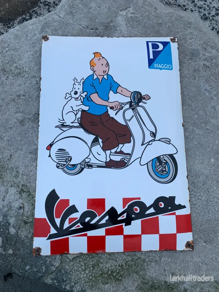 Tintin och Vespa-skylt Tintin och Vespa-skylt