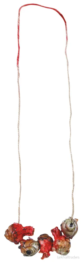 Prop, utskurna ögon halsband Prop, utskurna ögon halsband