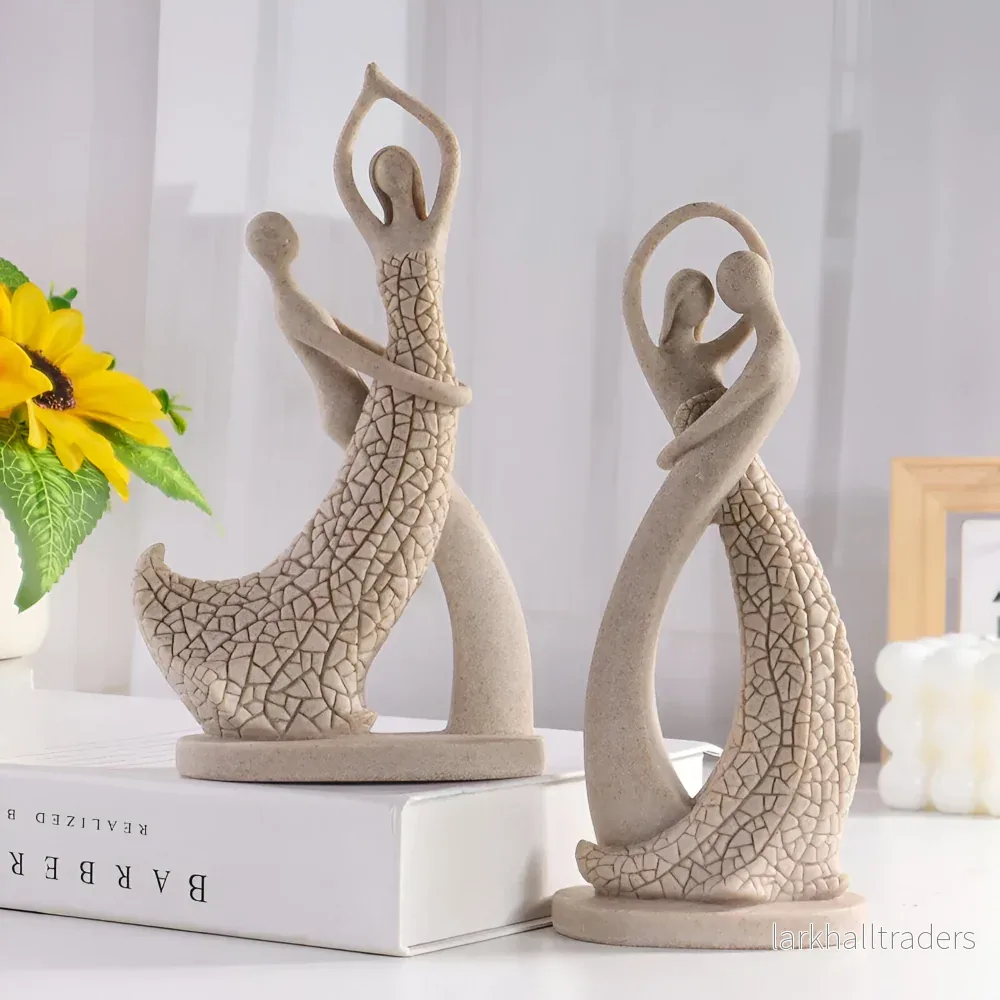 SandHeart Duo – Elegant Romantiskt Par i Sandstensliknande Resin SandHeart Duo – Elegant Romantiskt Par i Sandstensliknande Resin