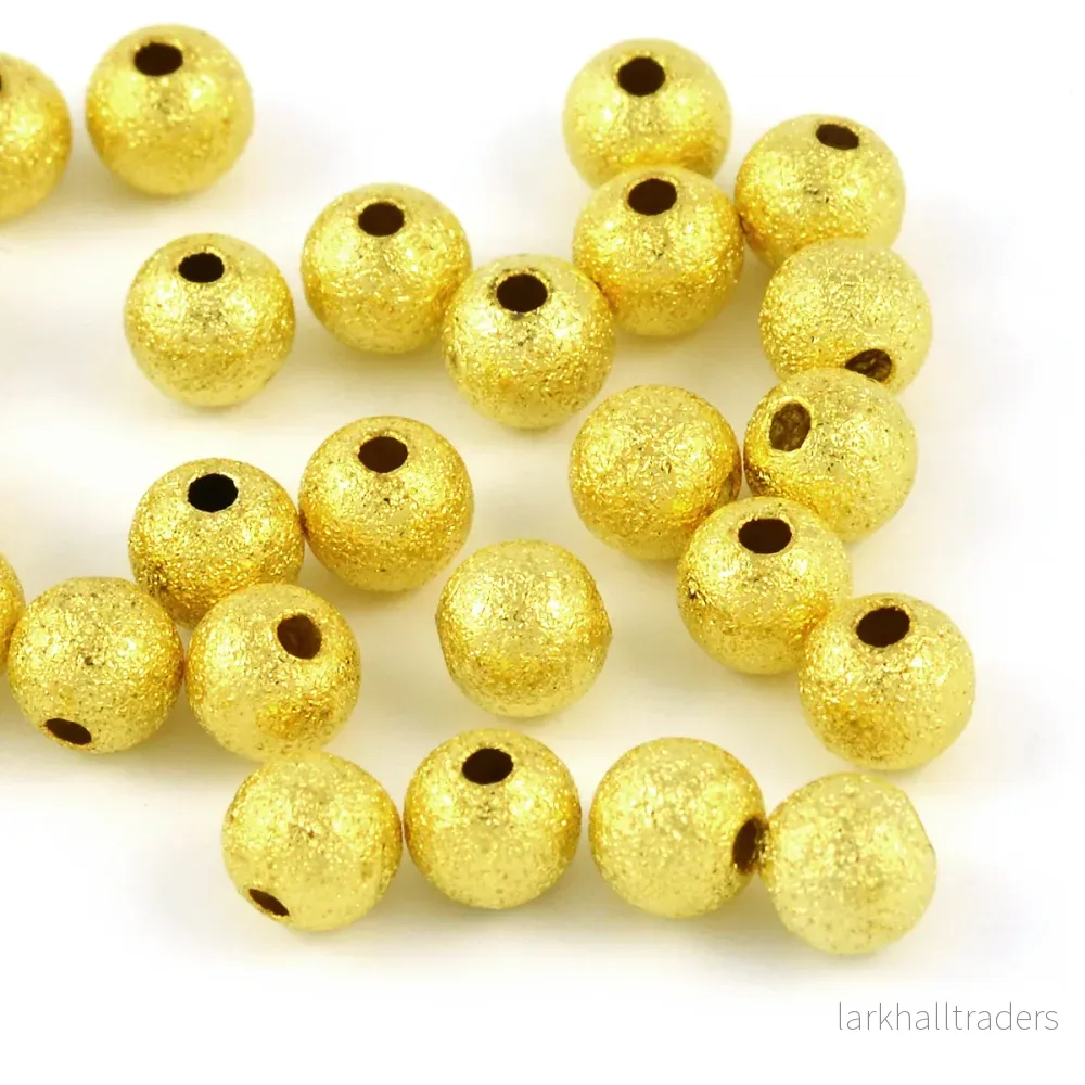 Stardust pärlor, 6mm, guld