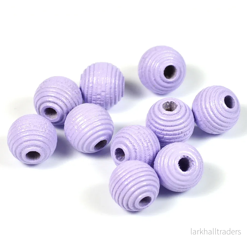 Räfflade träpärlor, 10mm, lavendel, 35st Räfflade träpärlor, 10mm, lavendel, 35st
