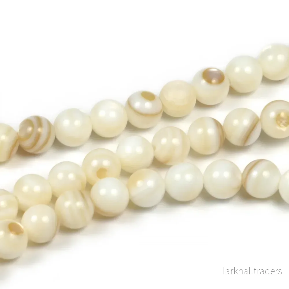 Runda snäckskalspärlor, ivory, 6mm