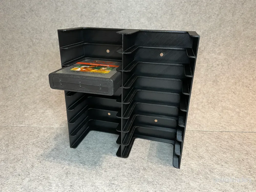 Vägghållare / Spelställ för 16 Atari 2600 spel Vägghållare / Spelställ för 16 Atari 2600 spel