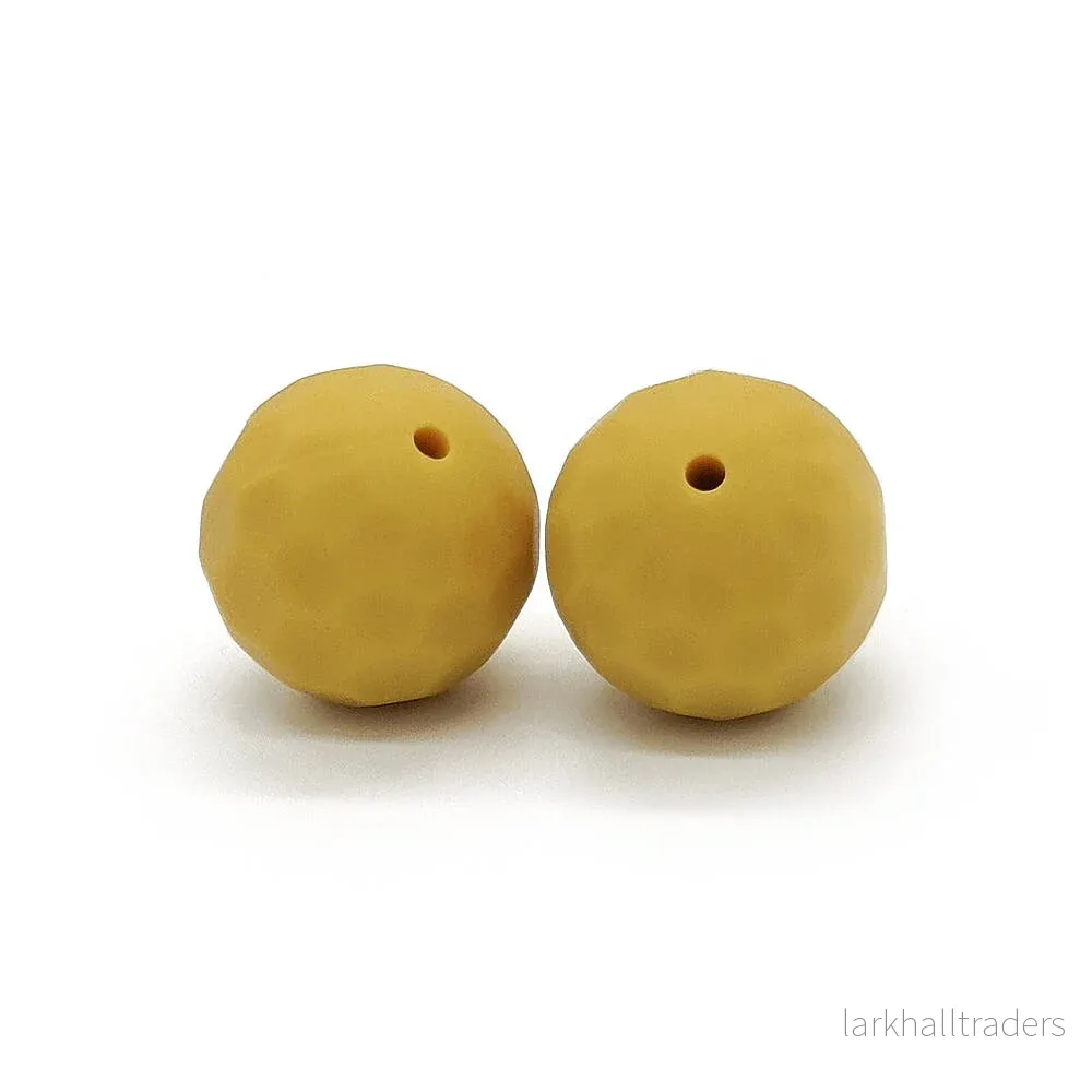 Facetterad silikonpärla, senapsgul, 15mm