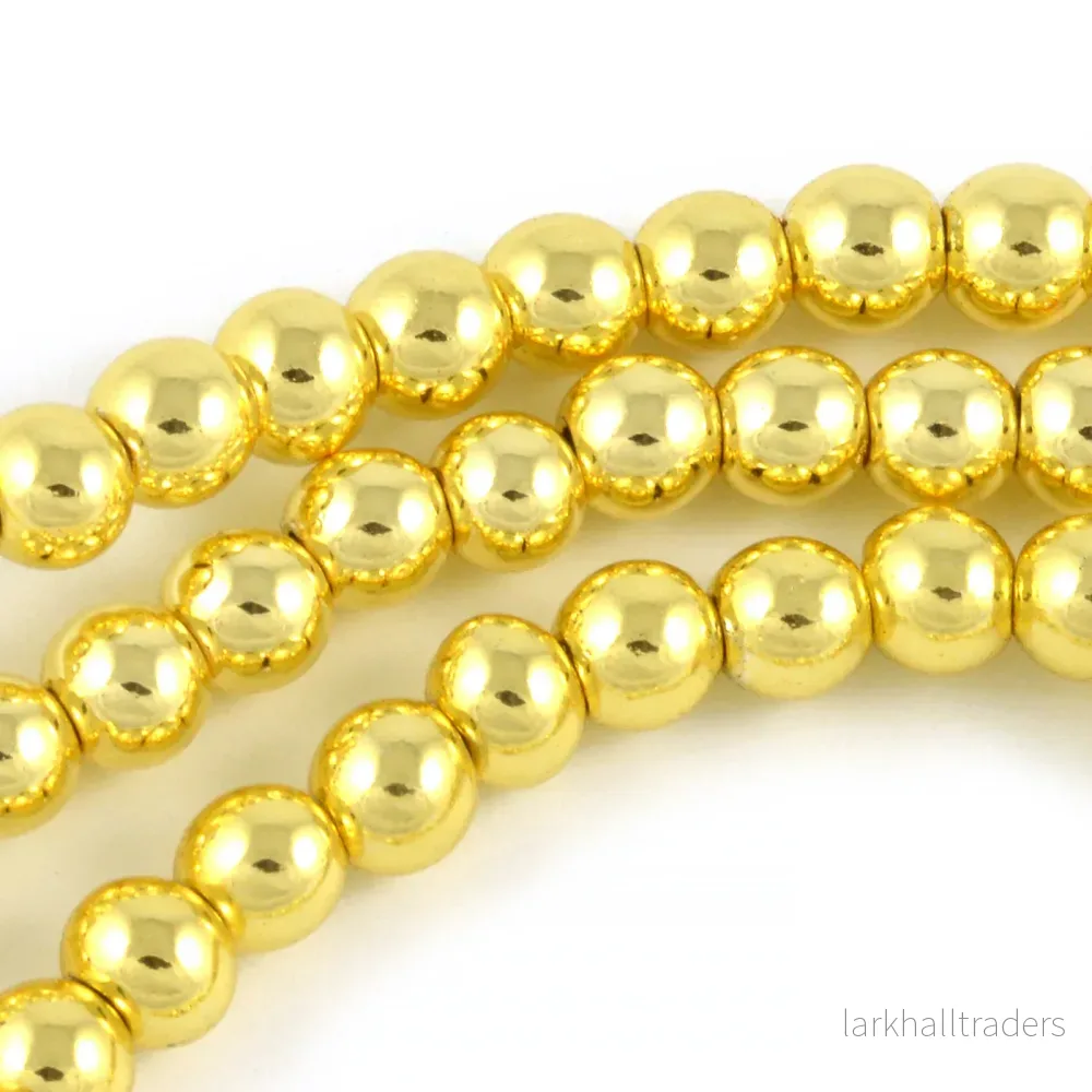 Syntetiska hematit pärlor, guld, 6mm