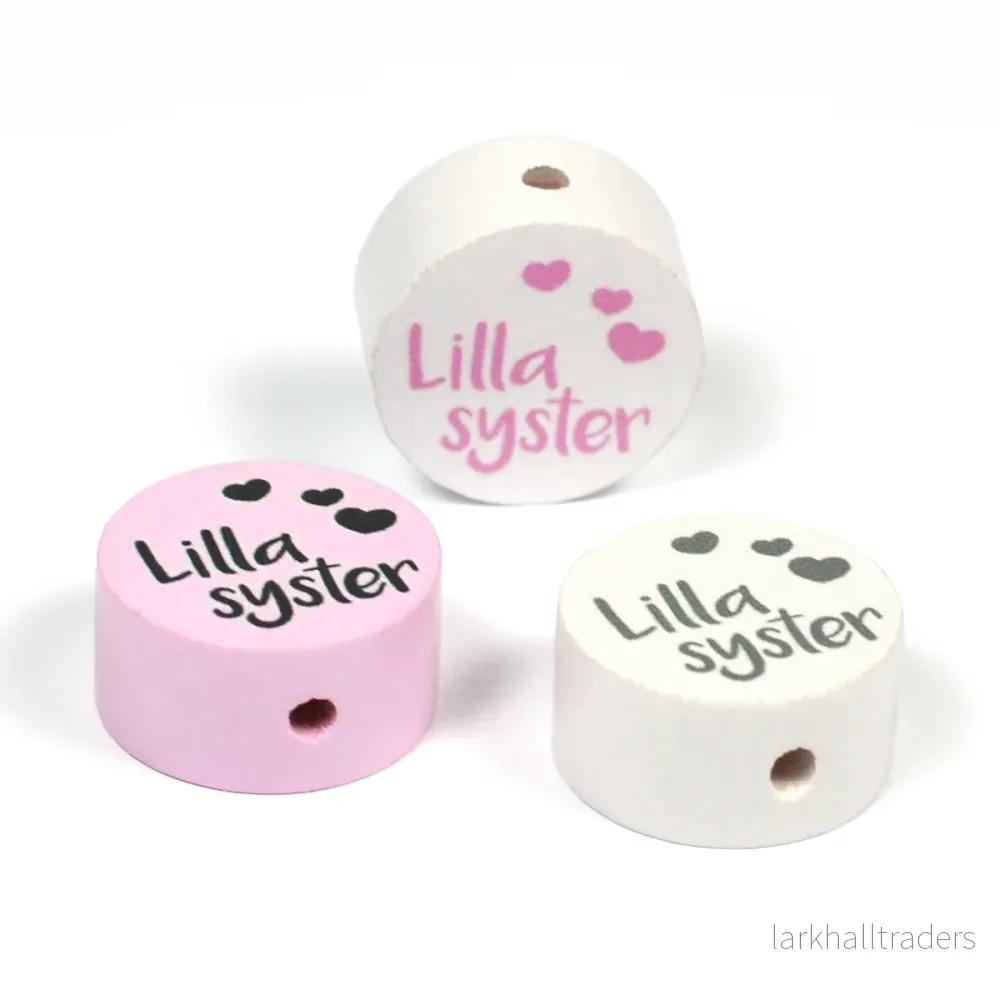 Motivpärla i trä, ”Lillasyster” Motivpärla i trä, ”Lillasyster”
