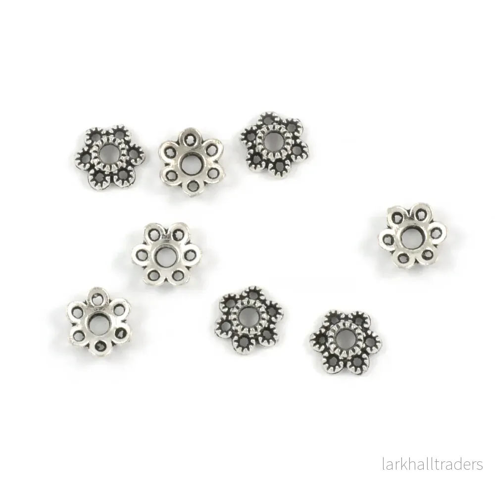 Pärlhattar, liten blomma, antiksilver, 5,5mm, 20st Pärlhattar, liten blomma, antiksilver, 5,5mm, 20st
