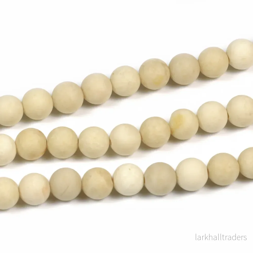 Frostade fossil pärlor, beige, 6mm