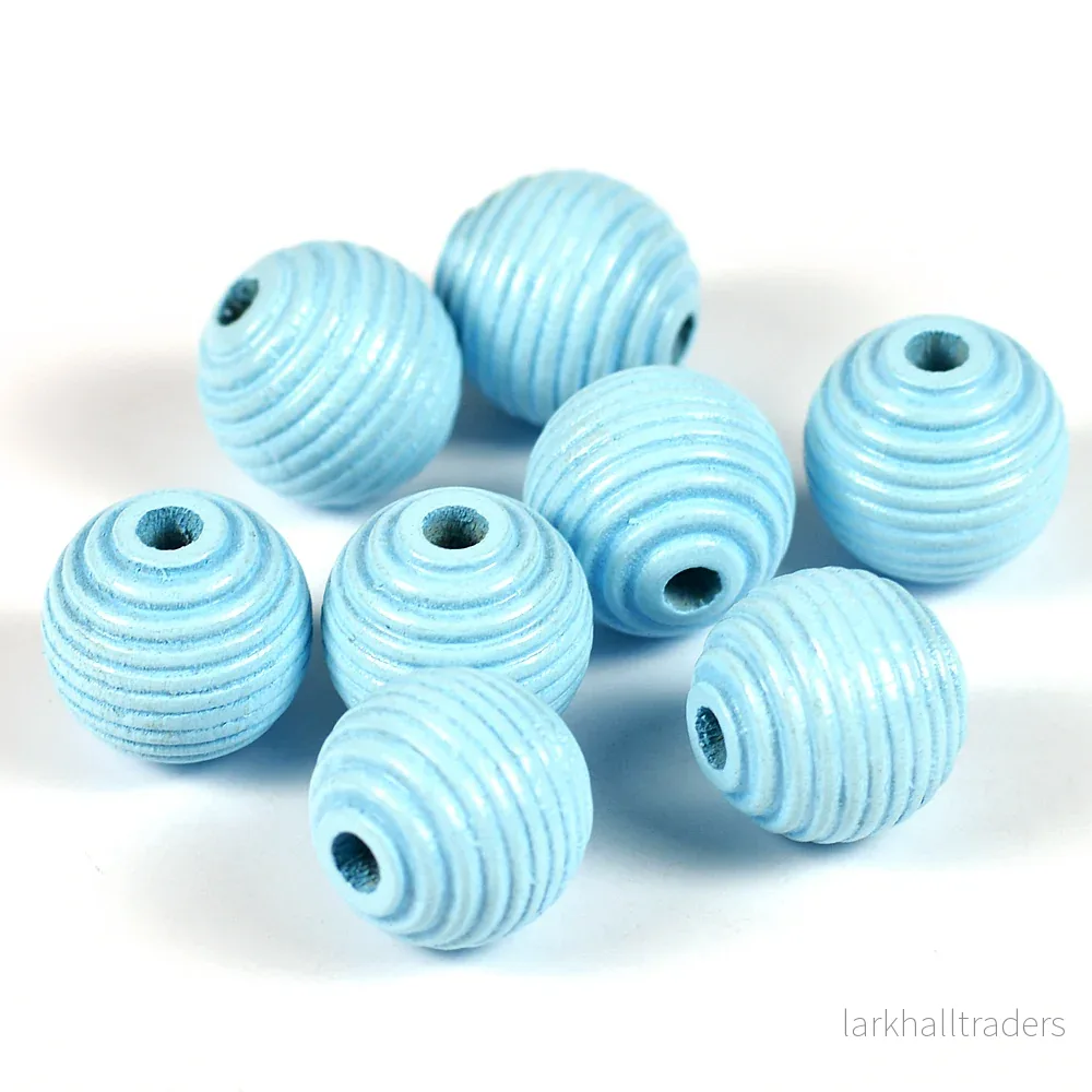 Räfflade träpärlor, 14mm, ljusblå, 16st Räfflade träpärlor, 14mm, ljusblå, 16st