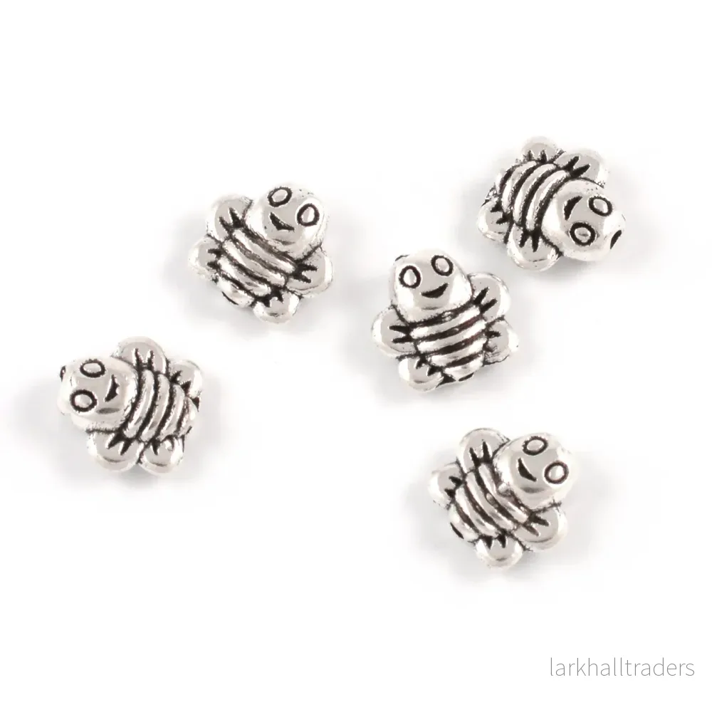 Metallpärlor, bi, antiksilver, 9mm, 10st