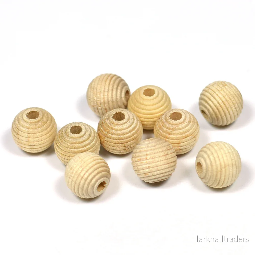 Räfflade träpärlor, 10mm, obehandlad, 35st Räfflade träpärlor, 10mm, obehandlad, 35st