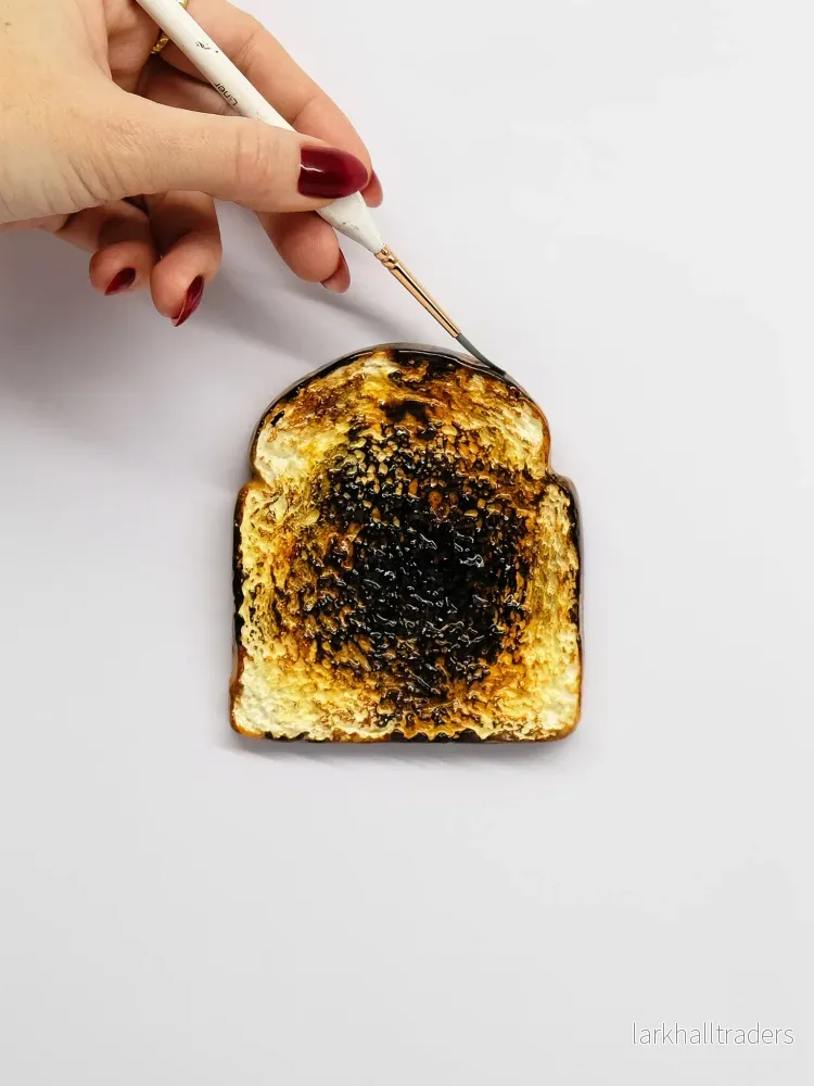 LA TARTINE BRÛLÉE Väggskulptur