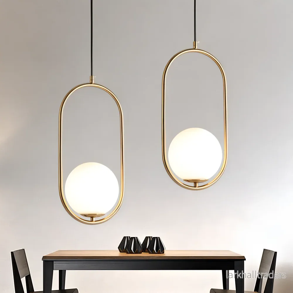 Eclipsera – Modern Guld Ellips Pendellampa med Glaskula Eclipsera – Modern Guld Ellips Pendellampa med Glaskula